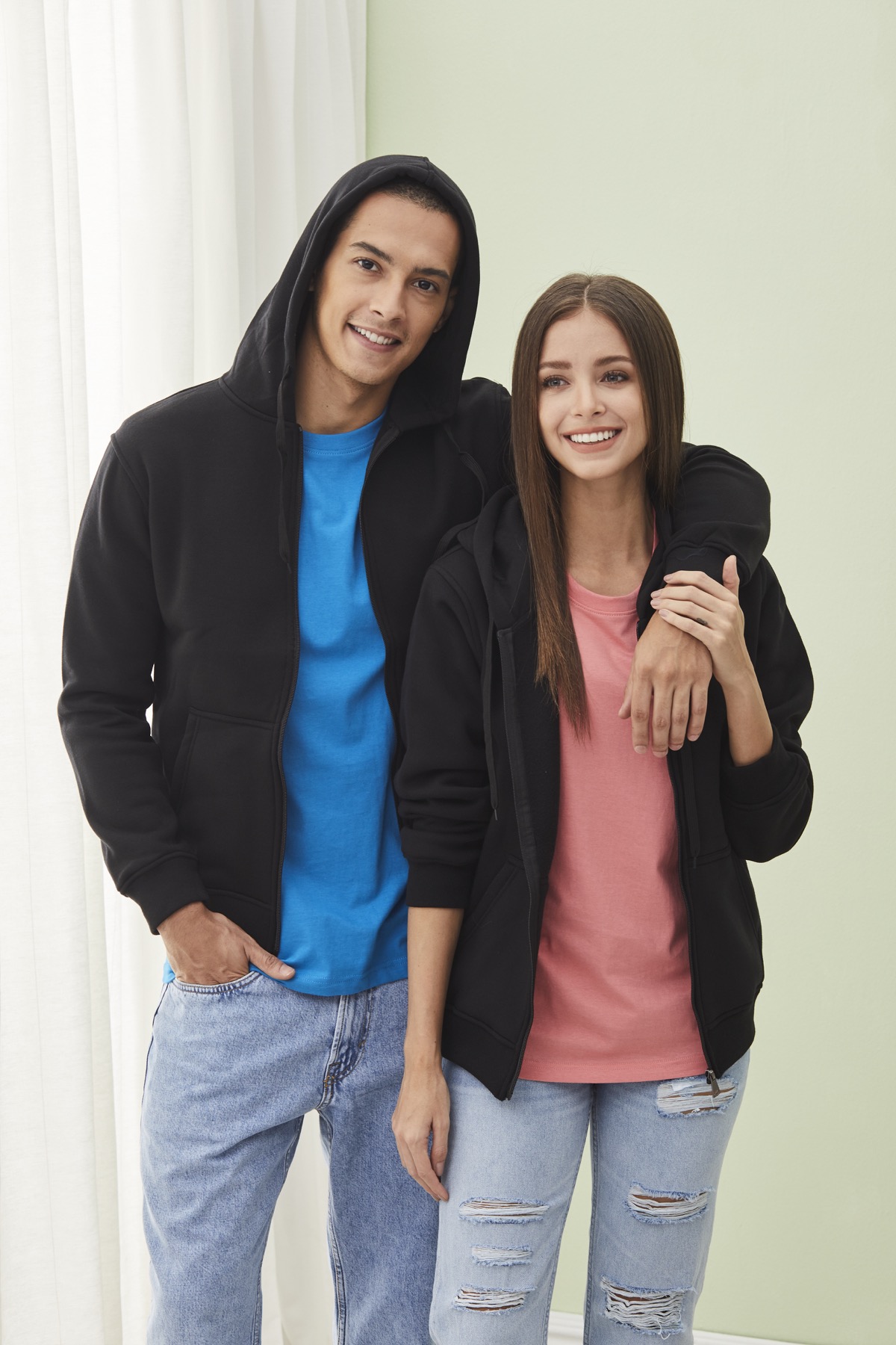 Models wearing black FJ01 fleece jackets