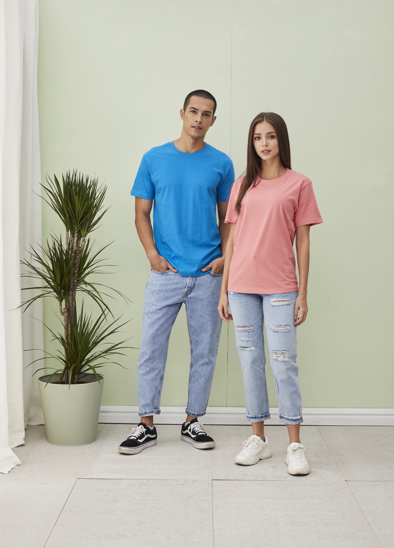 Models wearing blue and pink RC01 round neck cotton T-shirts