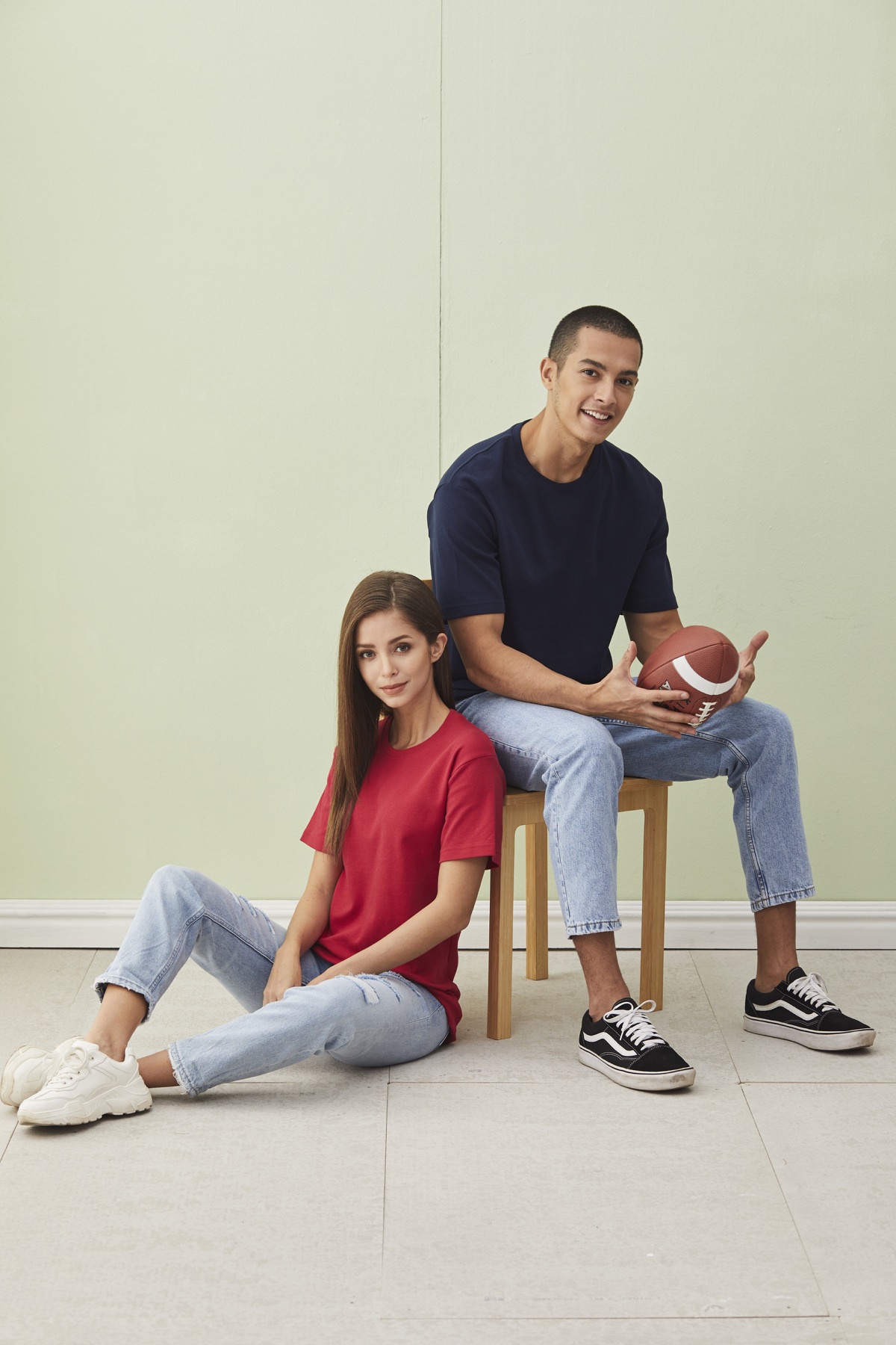 Models wearing red and navy RC06 cotton interlock T-shirts