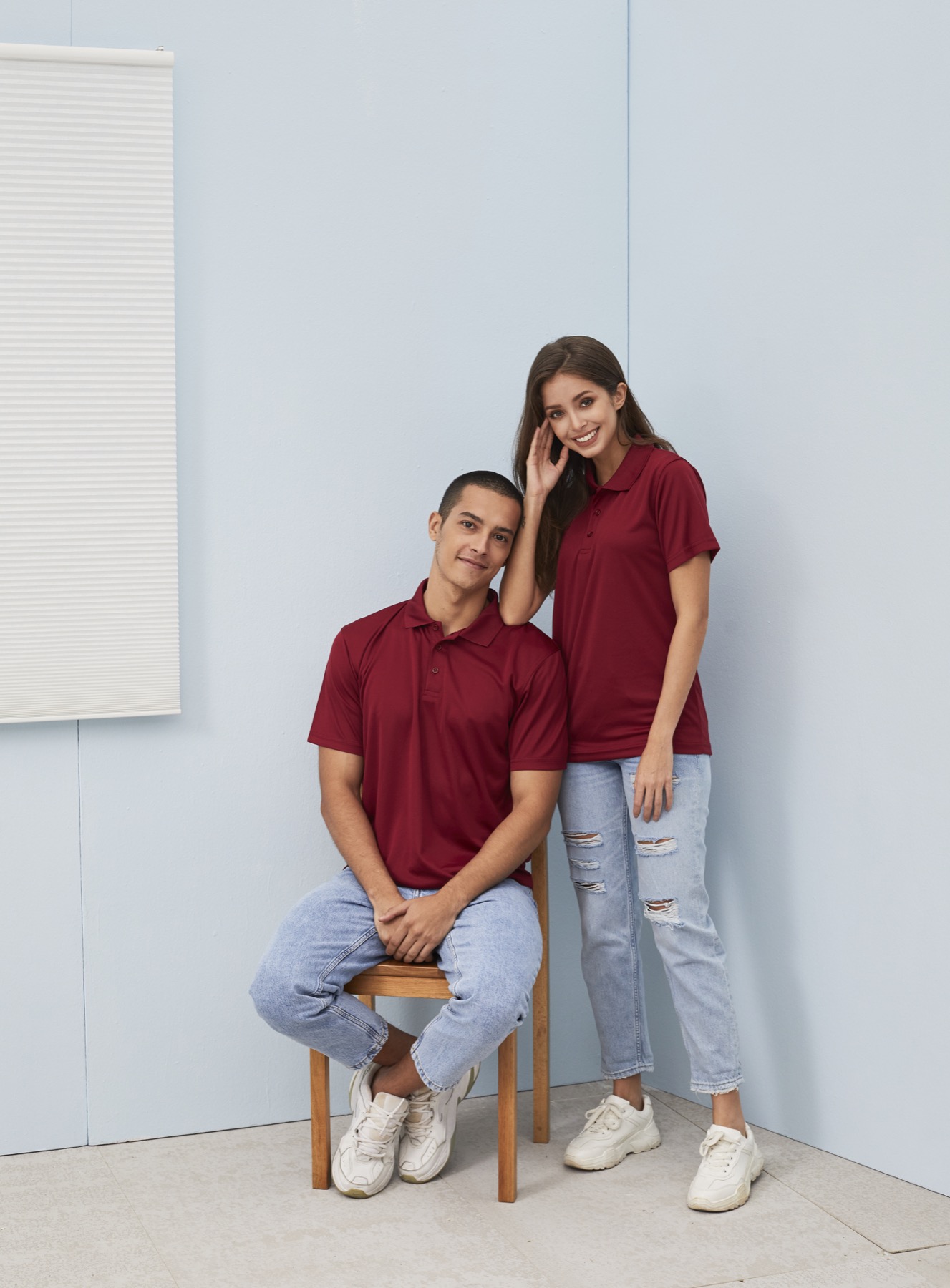 Models wearing maroon M2000 microfiber polo shirts